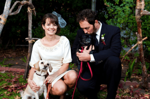 couple and dog on their wedding day